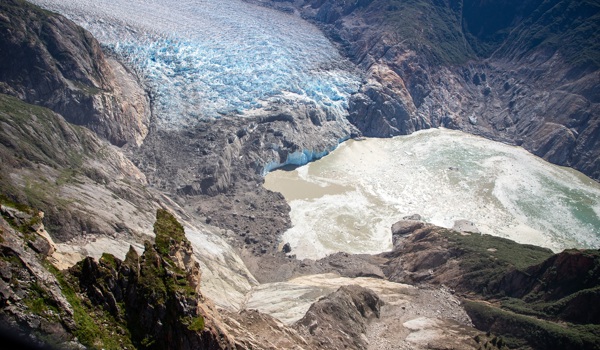 View of the landslide zone around the South Sawyer Glacier that triggered the megatsunami in Tracy Arm fjord. This photo was taken during a U.S. Geological Survey field reconnaissance flight on August 13, 2025. Credit: John Lyons/U.S. Geological Survey.